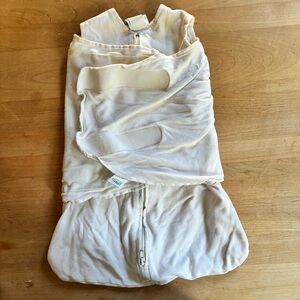 THREE halo swaddle sacks